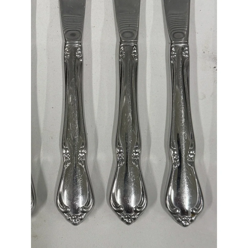 7pc Oneida Chateau Stainless Steel Dinner Knives Ornate Floral Scroll Handle